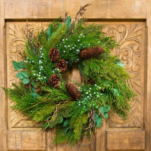 Christmas Wreath On Wooden Door